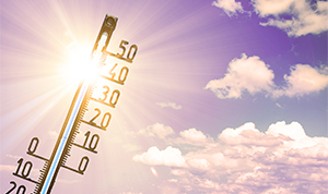 Schmuckbild "Hitzeschutz" Sonneschein und Hitzethermometer